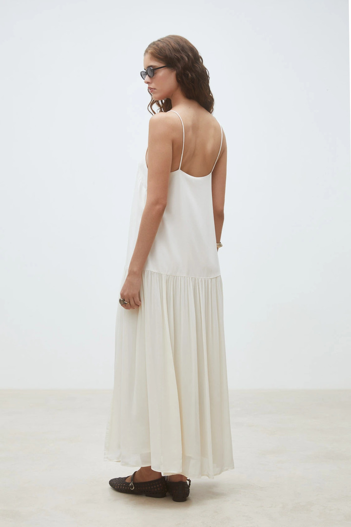 Carlota Long flowing plain dress with straps Cream